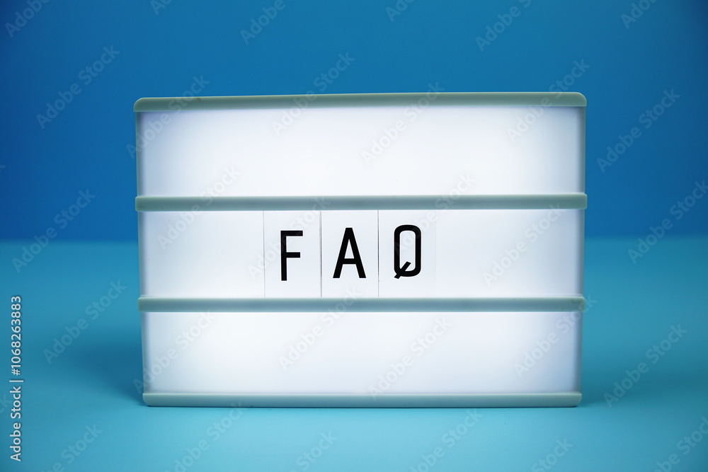 Poster faq (frequently asked questions) letterboard text on led lightbox on blue background