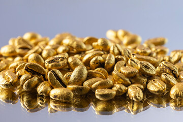 Gold plated coffee. Macro detail shooting, special focus (Golden coffee)