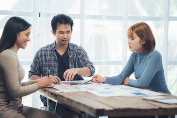 Collaborative Brainstorming: A diverse team of creative professionals engages in a lively brainstorming session.