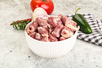 Fresh raw chicken hearts in the bowl