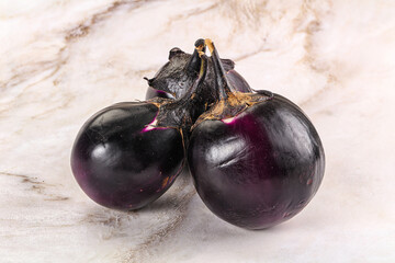 Raw violet and black eggplant