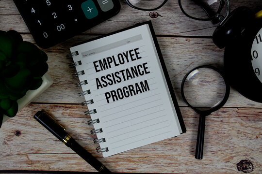 Employee Assistance Program (EAP) text on notepad, Business and Financial concept background