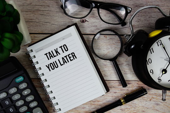 Talk To You Later (TTYL) text on notepad, Business and Financial concept background