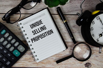 Unique Selling Proposition (USP) text on notepad, Business and Financial concept background