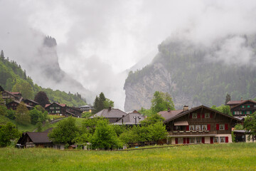 Lauterbrunnen, Village in Switzerland, in the Swiss Alps, Beautiful Valley with rocky cliffs and...