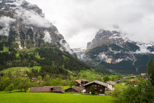 Grindelwald village located in Switzerland&rsquo;s Bernese Alps, Eiger Mountain, Gletscherschlucht, waterfalls and striated limestone walls