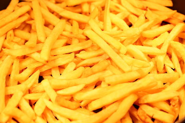 A delightful pile of golden, crispy French fries is now ready to be enjoyed with your favorite dip or delicious sauce