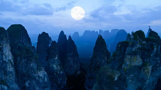 Otherworldly 360-degree video of a moonlit limestone karst landscape at night