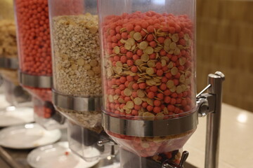 A colorful candy dispenser filled with a delightful assortment of snacks, ideal for a fun treat experience