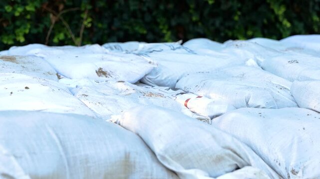 Dam construction to prevent flooding - sandbags