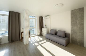 studio kitchen with sofa for rent