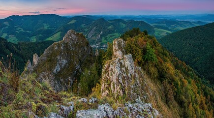 Beautiful landscape with high rocks, forest, sky. Morning sunrise with colorful sky and autumn...
