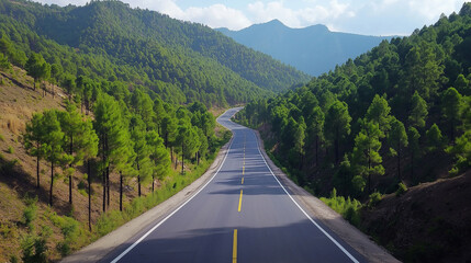 Highway Through High and Low Mountain Peaks Amidst Nature’s Grandeur