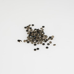 A Glimmering Collection of Marcasite Stones on a Clean White Background