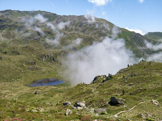 Hiking Karspitze one of the peaks on Nordkette mountain range in Tyrol, Austria in summer
