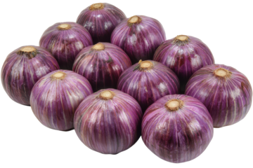 Fresh organic garlic cloves arranged neatly on a wooden cutting board