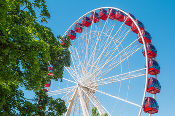 Scenic View of Ferris Wheel Against Clear Blue Sky