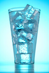 alcoholic cocktail with ice on blue background, macro. glass of soda with ice