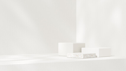 Background featuring an empty product display mockup with a white backdrop and abstract geometric platforms designed for showcasing merchandise in landscape orientation.