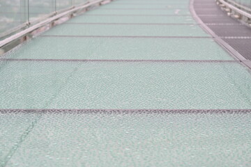 
Raindrops on the glass floor of the northernmost skywalk in Siam, Mae Sai District, Chiang Rai Province, Asia, Thailand