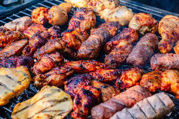 grilled meat over the coals on barbecue
