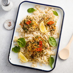 Baked white fish with herbs and bulgur