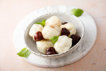 Homemade cottage cheese dumplings with cherry