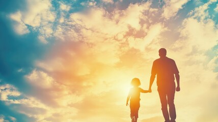 Fototapeta premium Father and child holding hands, walking against sunset sky, invoking sense of warmth connection