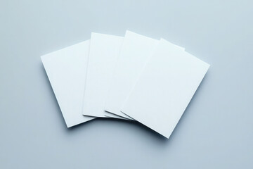 white rectangular blank 3 postcards lie spread out on desktop, minimalism, simple, style, background white background