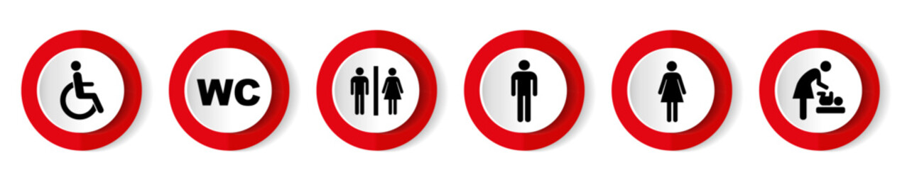 Signs indicating various restroom facilities in a public area, including accessible options, located in a city park