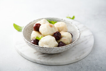 Homemade cottage cheese dumplings with cherry