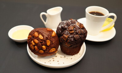 coffee and cake on a black background