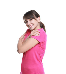 Fototapeta premium Young woman hugging himself on white background