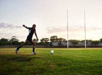 Rugby, man and kick for match, fitness and performance for game, stadium and player for...