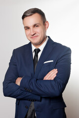 Portrait of handsome man in black blue suit