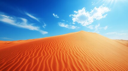 Naklejka premium Golden Desert Dune Under Vibrant Sky