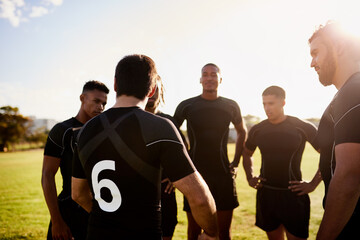 Fototapeta premium Rugby, team and workout together for exercise discussion, motivation and game field for match preparation. Sports, fitness and group of men outdoor with competition planning, club and practice