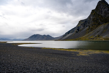 Beautiful Icelandic landscape with black beach and mountains Vestrahorn Stokksnes Islands