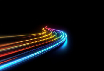 Abstract image of bright, vibrant, glowing neon lines in various colors that curve through a black background.