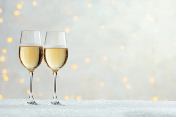 Two Glasses of Champagne on Festive Background
