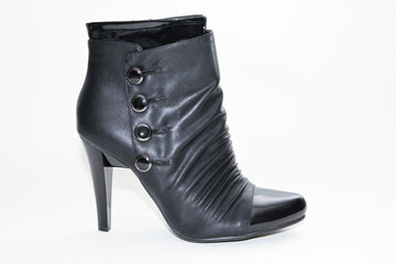 Women's Winter Boots and Shoes. On a white background. Side view. Unbranded model.