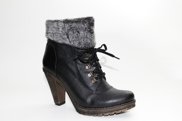 Women's Winter Boots and Shoes. On a white background. Side view. Unbranded model.