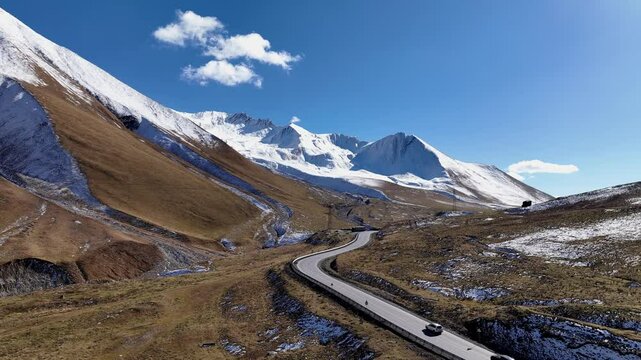 Aerial view with Lorry truck on the road surrounded by winter Landscape	