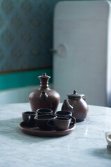 Traditional jugs are made from earth to store drinks at the table