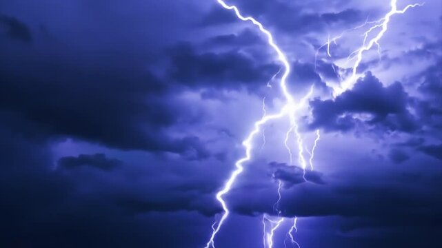 幻想の雷光 - 夜を照らす青と紫の幻想的なエネルギーが舞う雷エフェクト。 真夜中の空と大地を明るく照らす、無数の雷が走ります。雷の迫力と神秘性が共存する幻想的な演出です。SF作品やファンタジー作品にぴったりの映像素材です。壮大なエネルギーの流れを感じさせる、印象的でインパクトのあるシーンをお楽しみください。