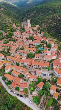 Aerial view of Eus, the medieval hilltop town in Pyrenees mountains, France. 