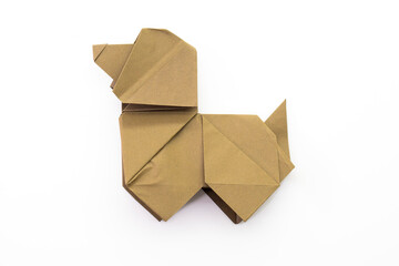 Paper dog on white background. Origami dog. Nature concept