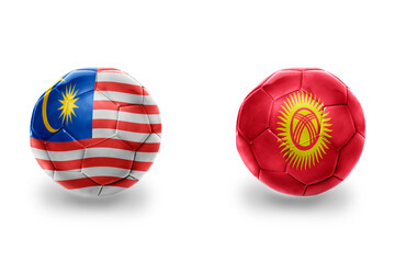 football balls with national flags of kyrgyzstan and malaysia ,soccer teams. on the white...