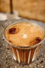 A cup of exquisite and delicious latte coffee close-up