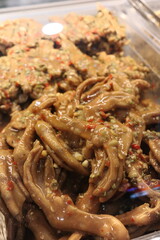 Spicy and delicious cold duck feet, a local snack in China